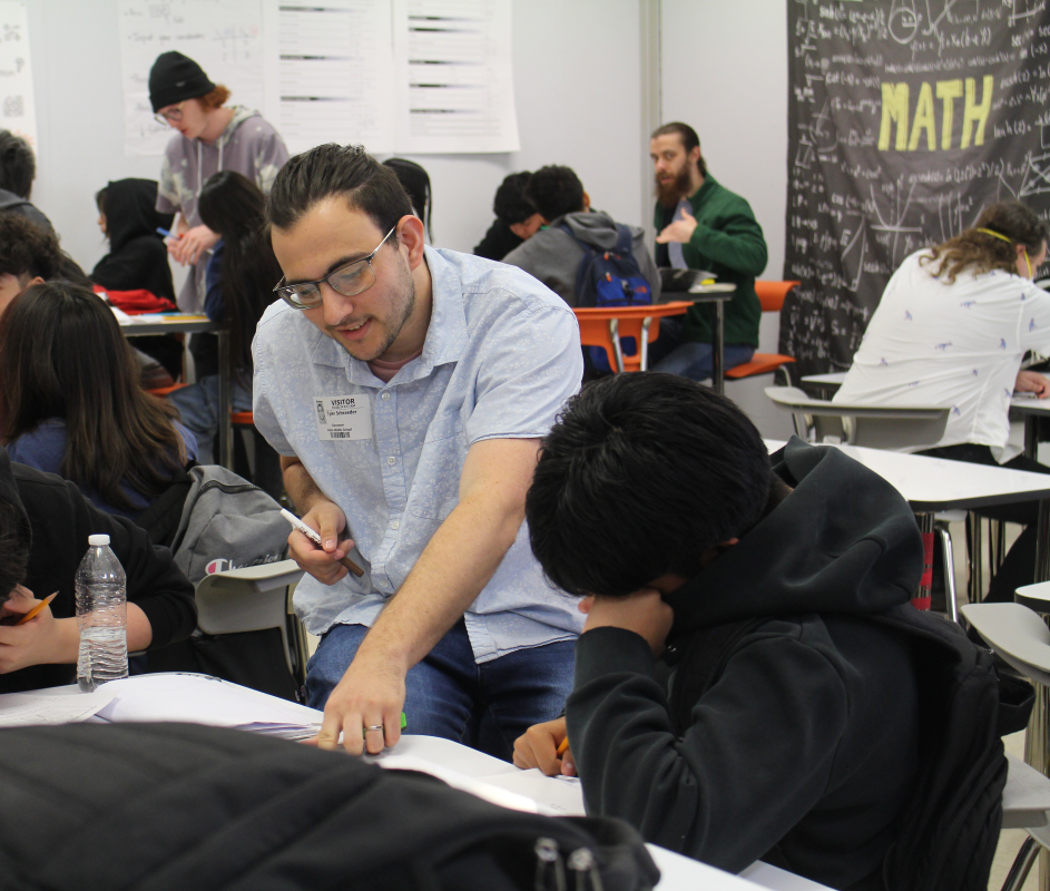 A classroom coach paired with an AISD middle school student.